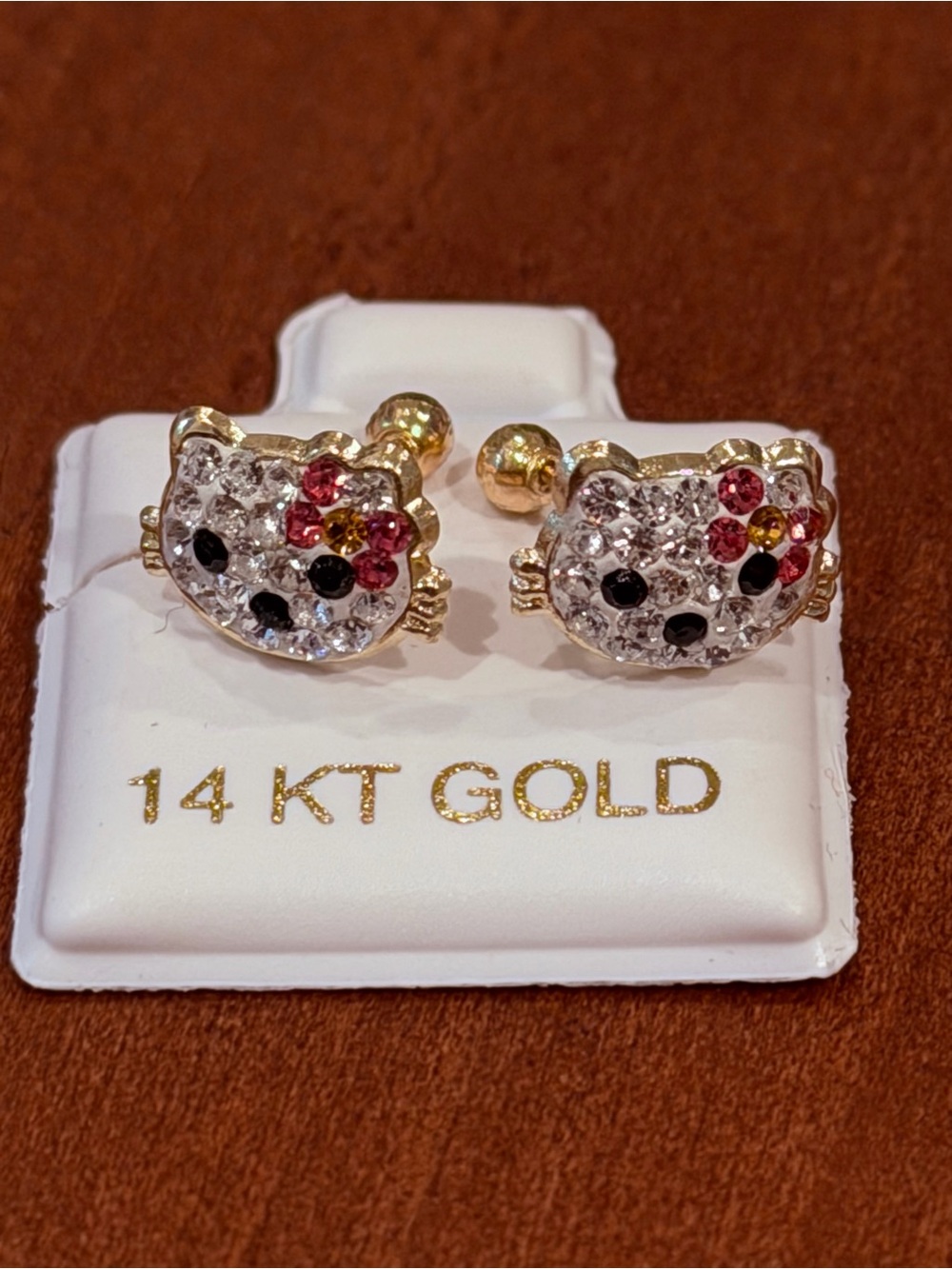 Cat Cz Yellow 14 karaty Gold Stud Earring 
100 % 14 Karat Gold